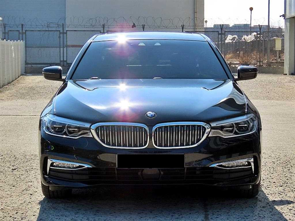 BMW 5-Series — photo 01