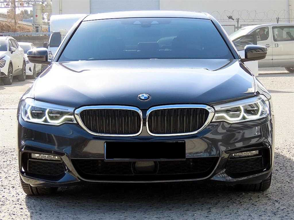 BMW 5-Series — photo 01