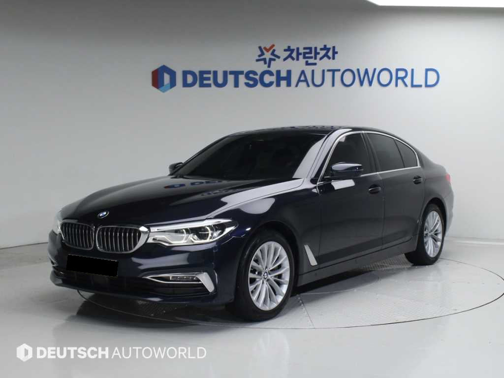 BMW 5-Series — photo 01