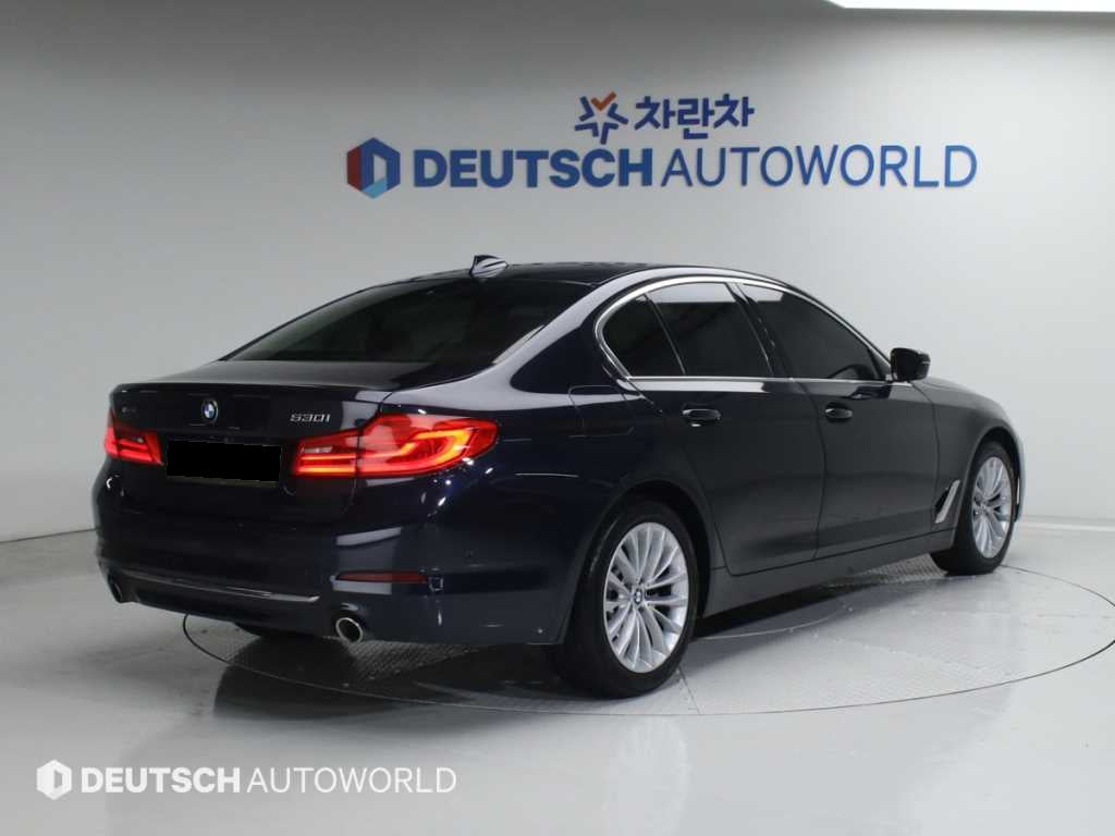 BMW 5-Series — photo 02