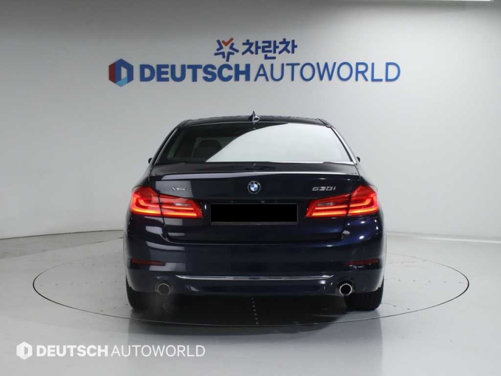 BMW 5-Series — photo 04