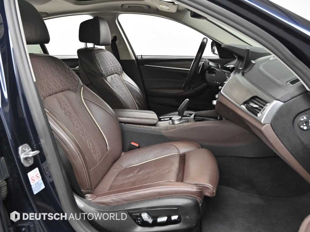 BMW 5-Series — photo 10