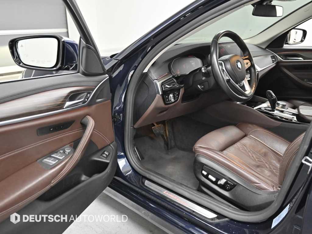 BMW 5-Series — photo 11