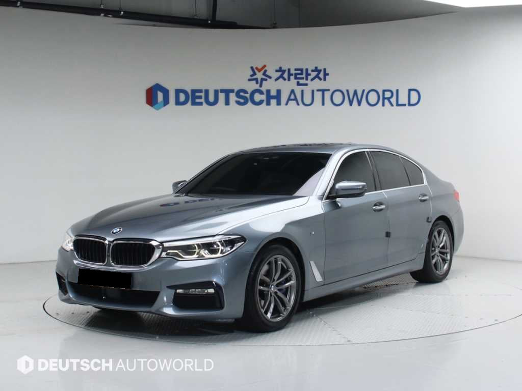 BMW 5-Series — photo 01