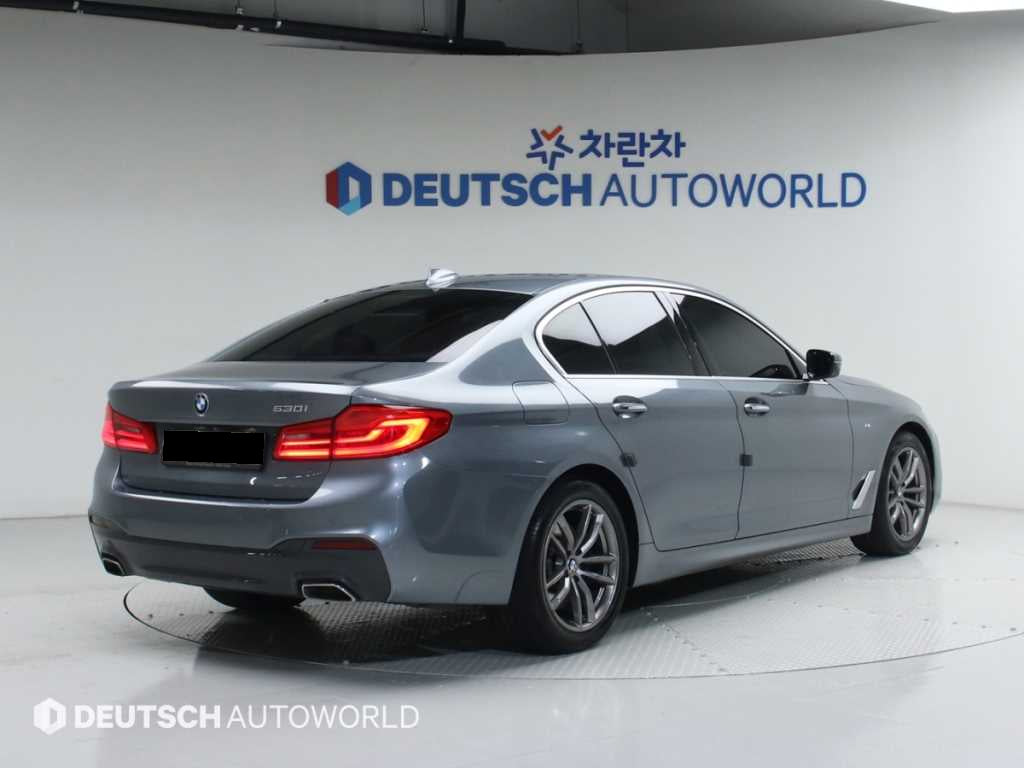 BMW 5-Series — photo 02