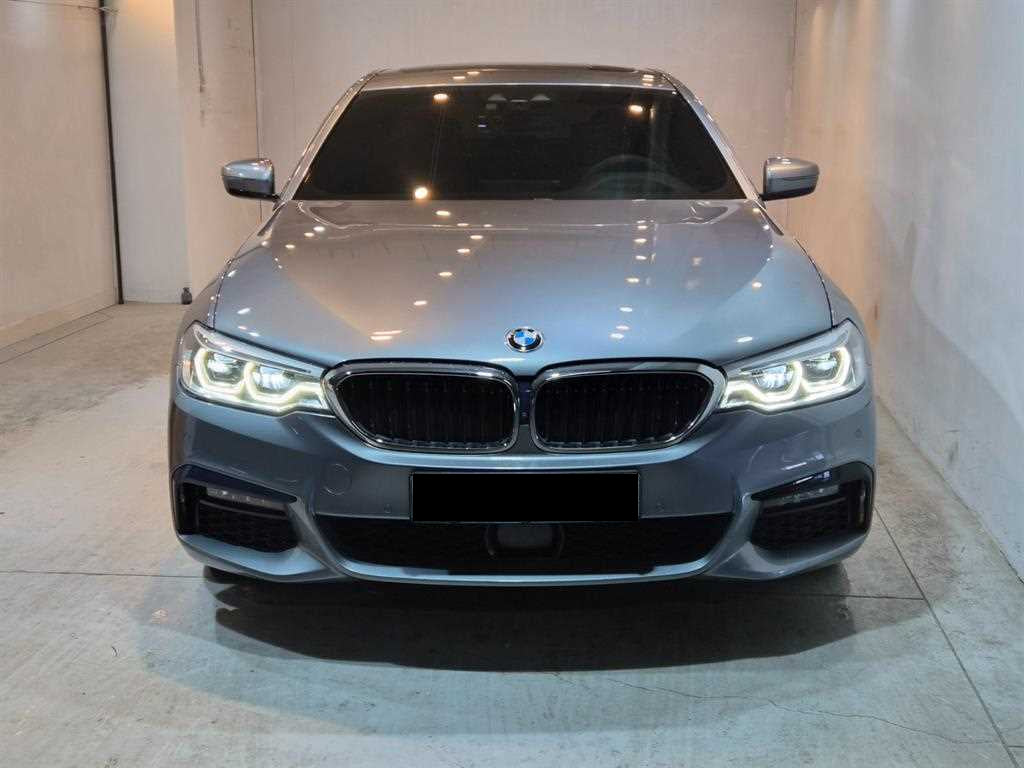 BMW 5-Series — photo 01