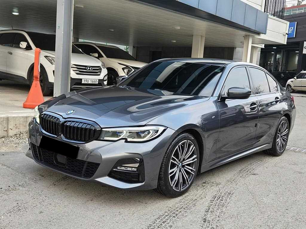 BMW 3-Series — photo 01