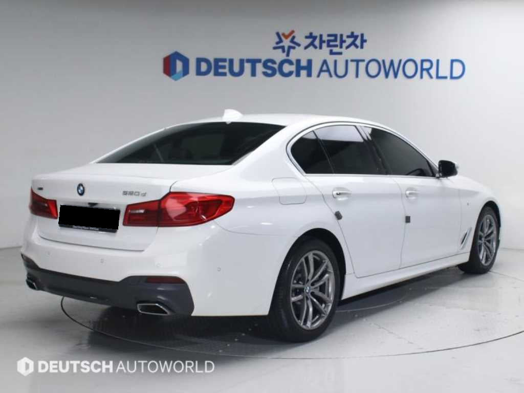 BMW 5-Series — photo 02
