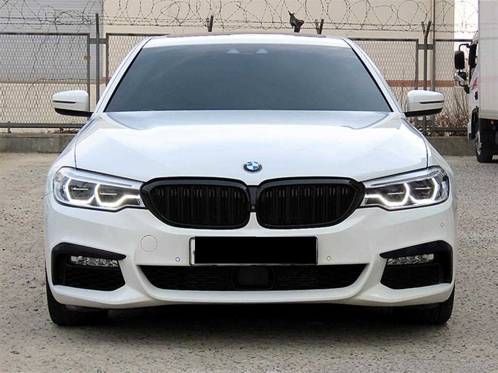 BMW 5-Series — photo 01