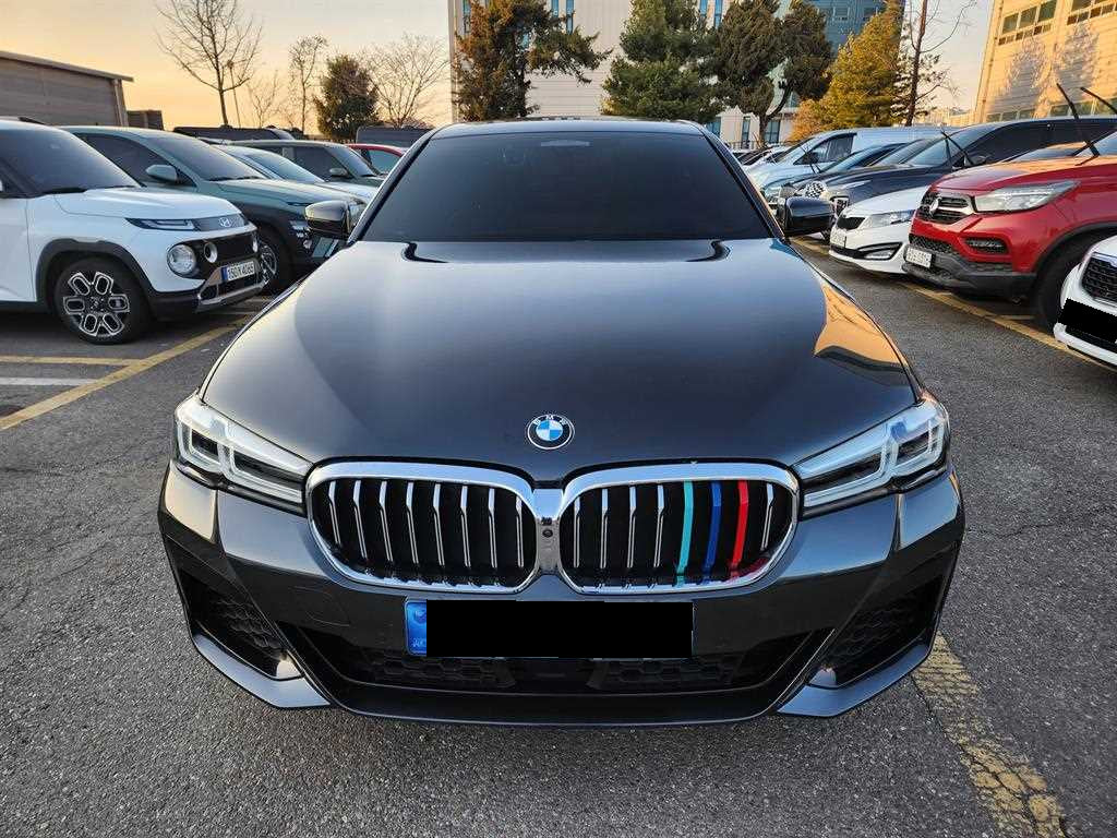 BMW 5-Series — photo 01