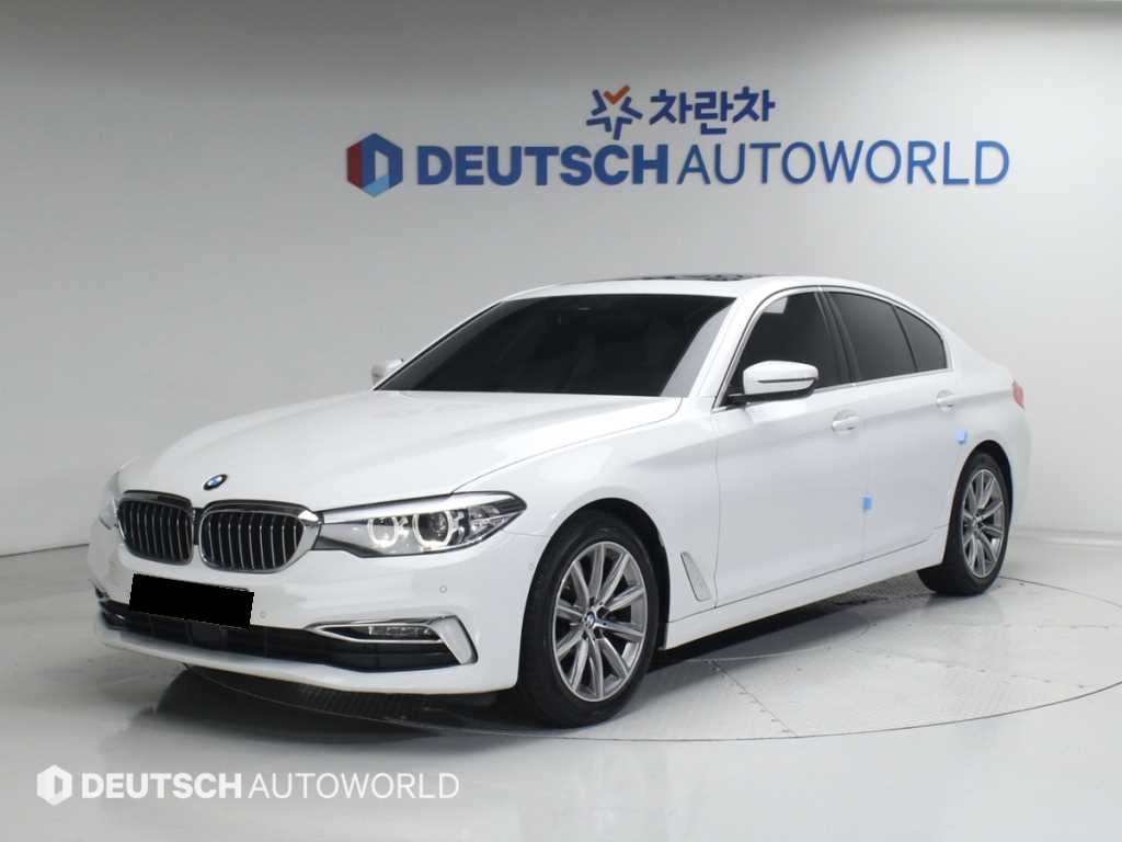 BMW 5-Series — photo 01