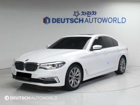 BMW 5-Series — photo 01