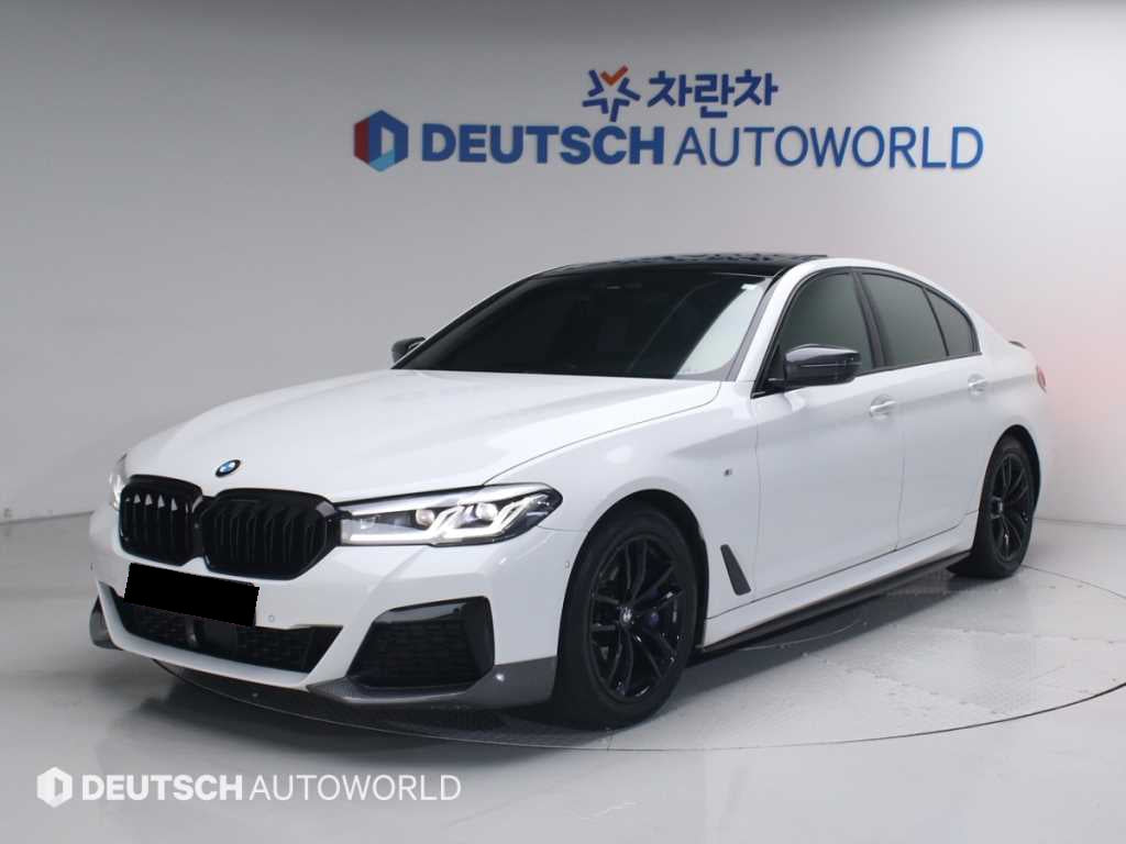 BMW 5-Series — photo 01