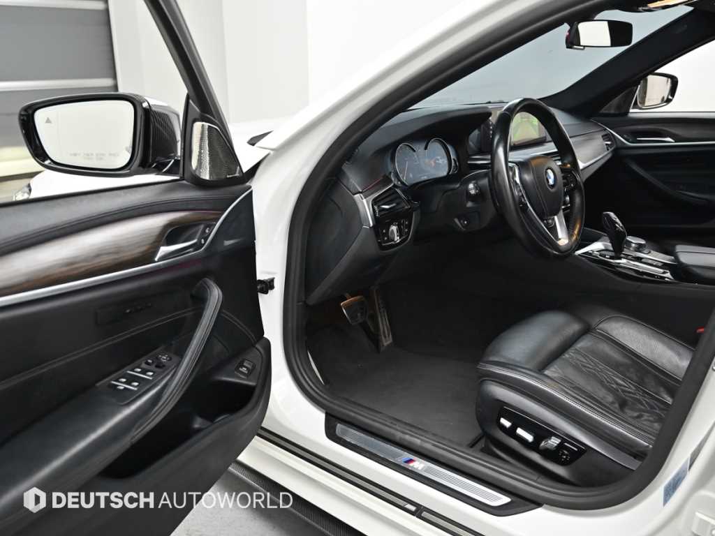 BMW 5-Series — photo 11