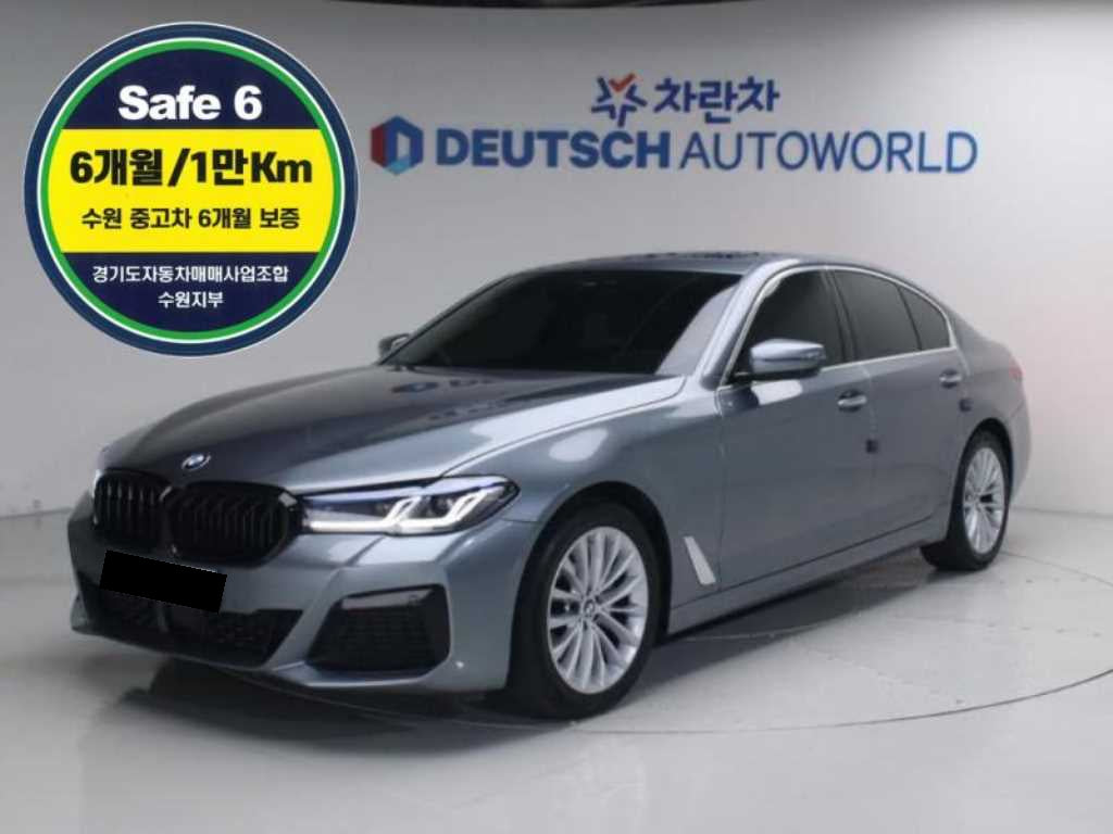 BMW 5-Series — photo 01