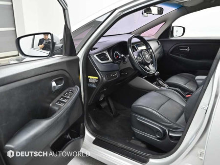 Kia Carens — photo 11