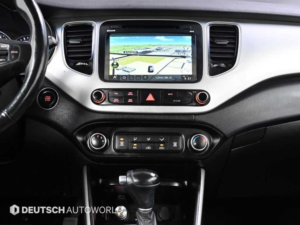 Kia Carens — photo 14