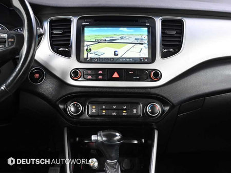 Kia Carens — photo 14