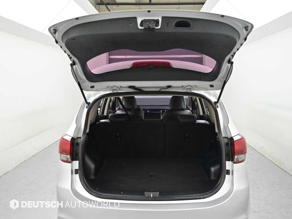 Kia Carens — photo 19