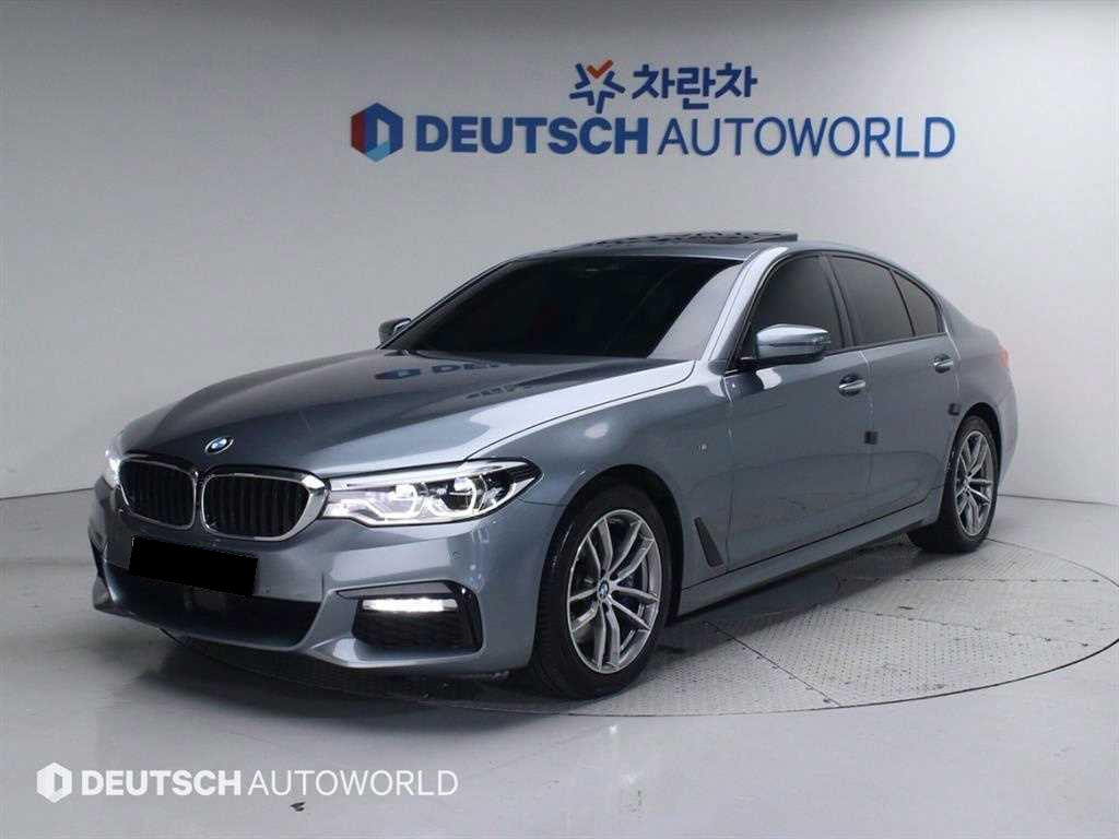 BMW 5-Series — photo 01