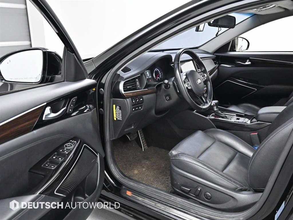 Kia K7 — photo 11
