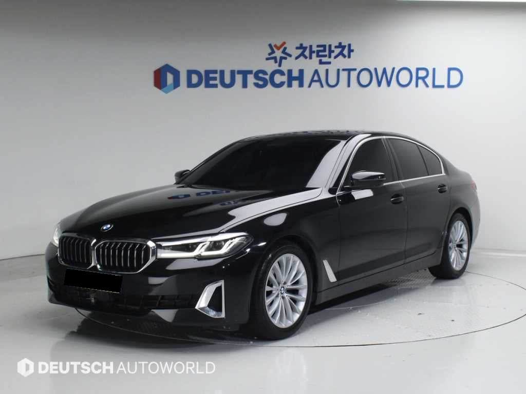 BMW 5-Series — photo 01
