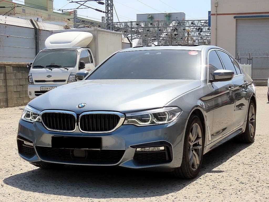 BMW 5-Series — photo 02