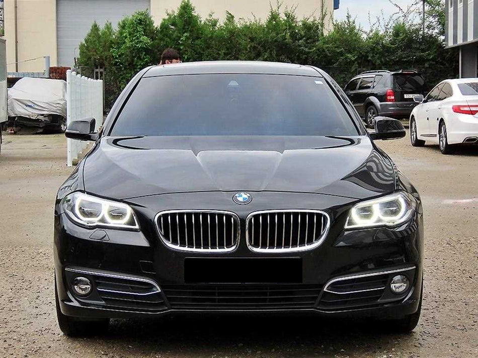 BMW 5-Series — photo 01