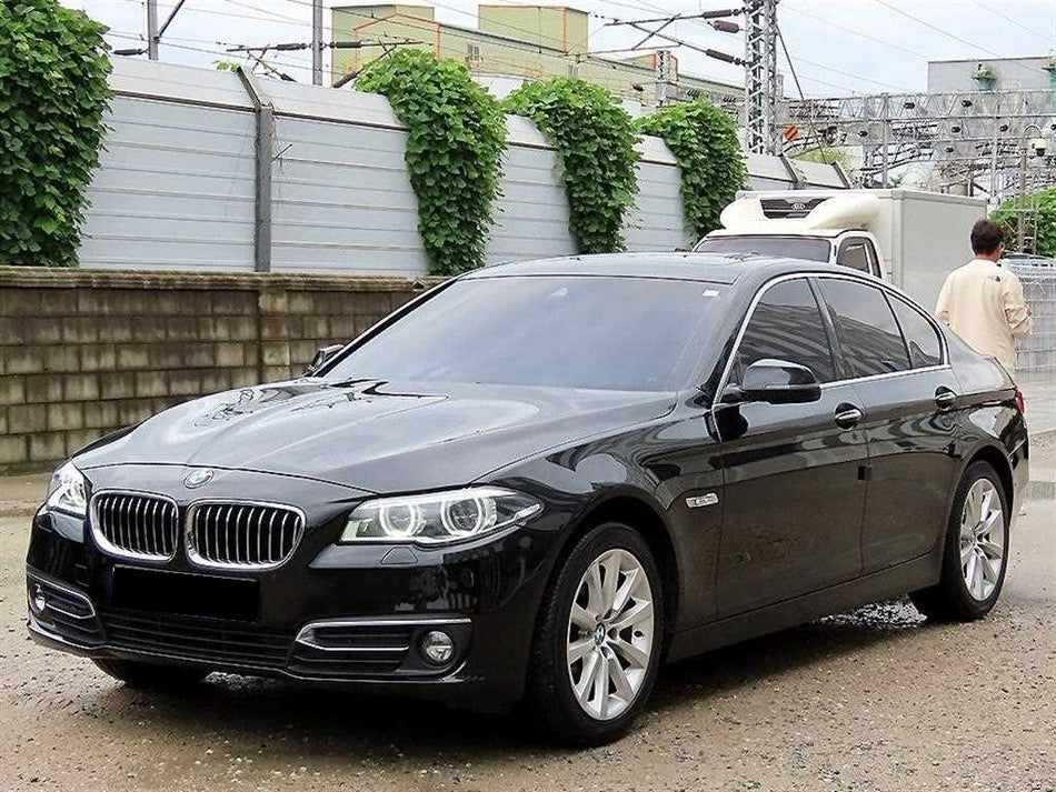 BMW 5-Series — photo 02