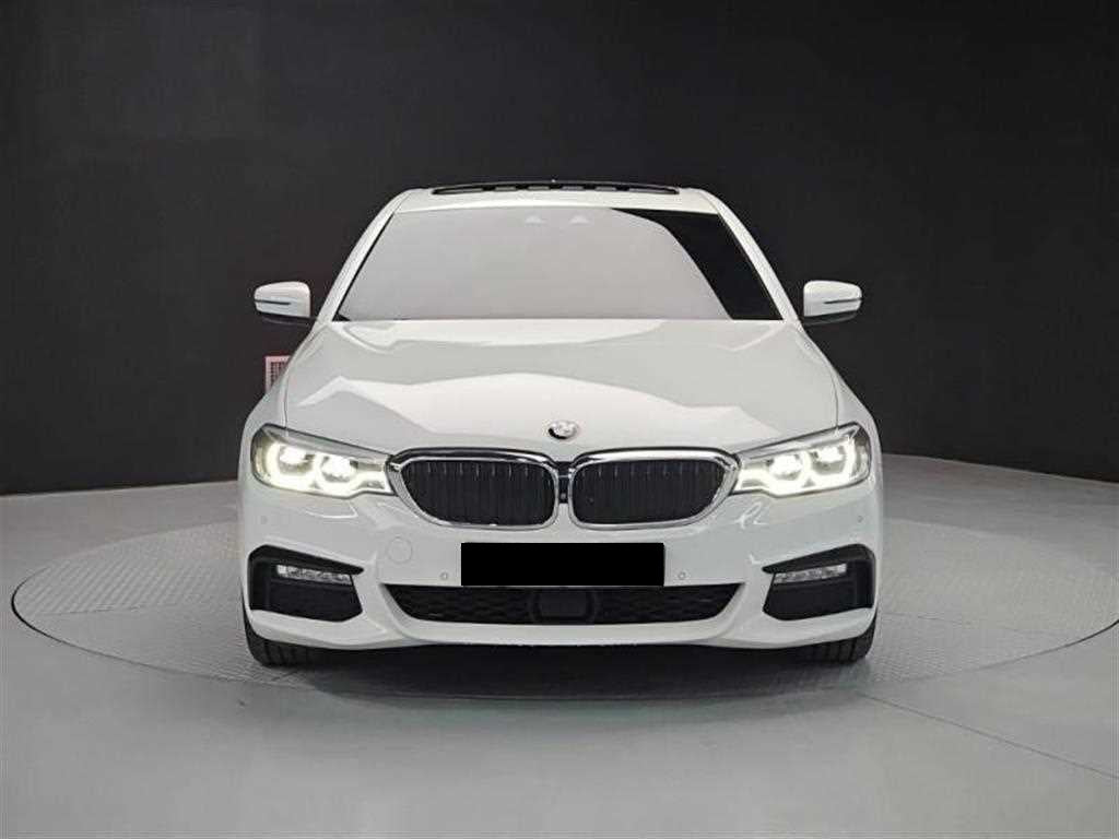 BMW 5-Series — photo 01