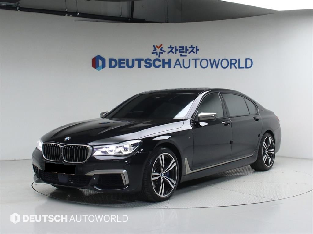BMW 7-Series — photo 01