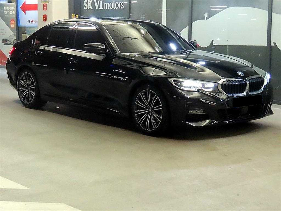 BMW 3-Series — photo 01