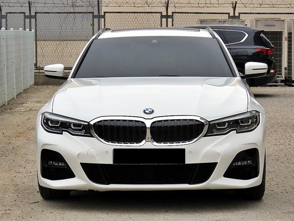 BMW 3-Series — photo 01
