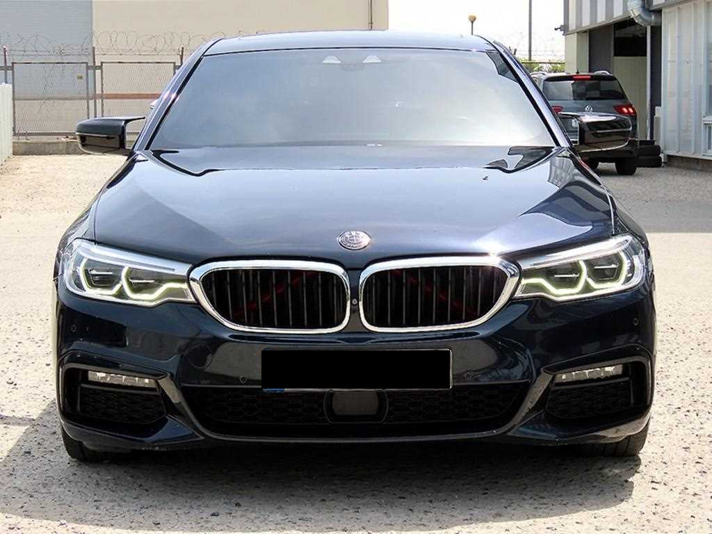 BMW 5-Series — photo 01