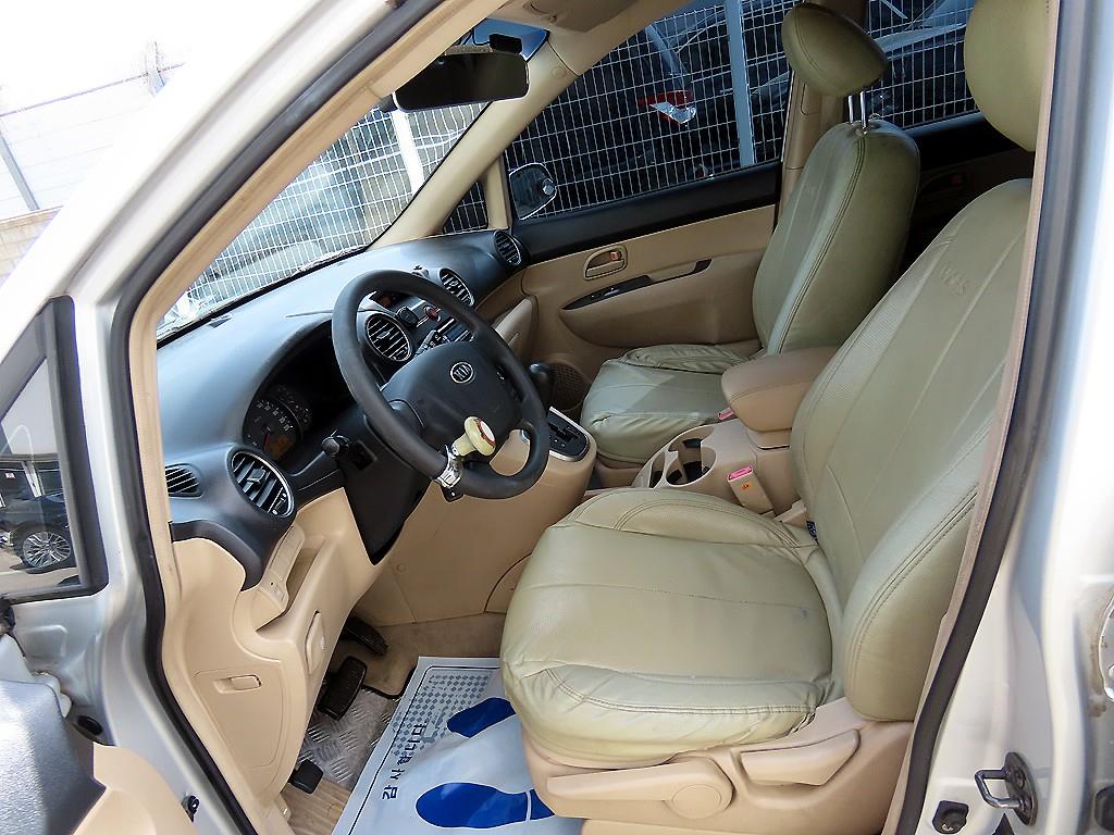 Kia Carens — photo 05