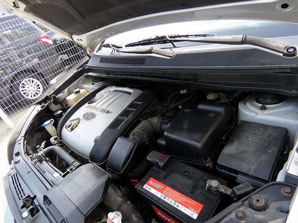 Kia Carens — photo 17
