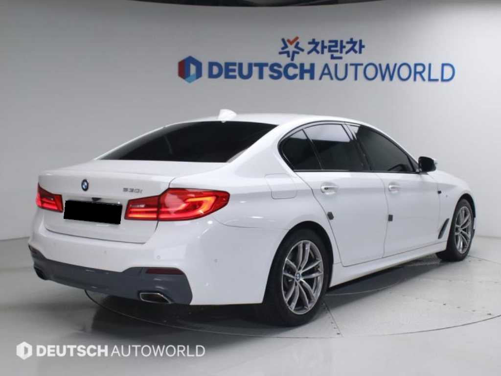 BMW 5-Series — photo 02