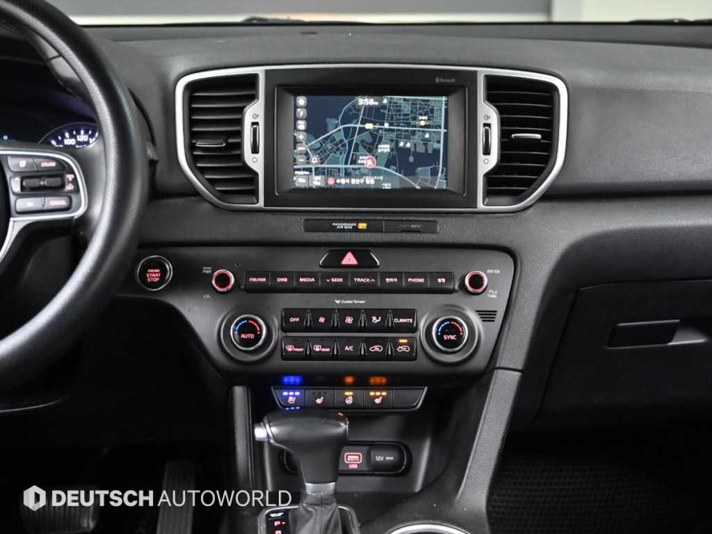 Kia Sportage — photo 14