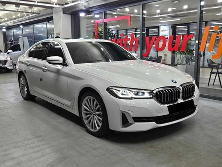 BMW 5-Series — photo 01