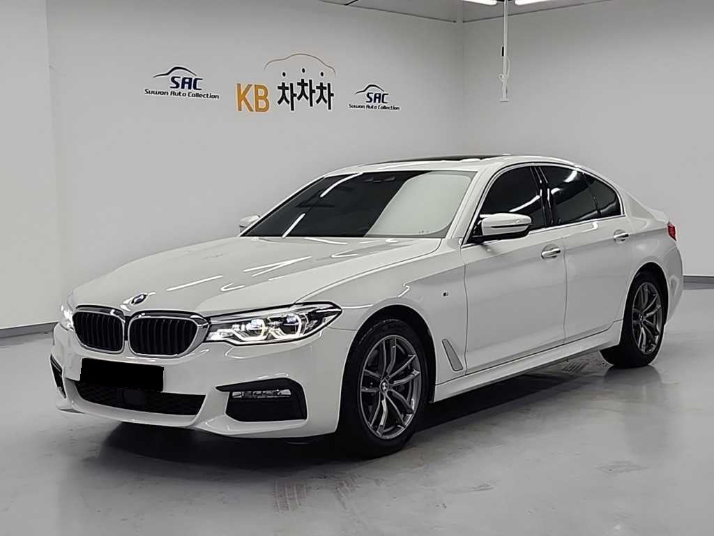 BMW 5-Series — photo 02