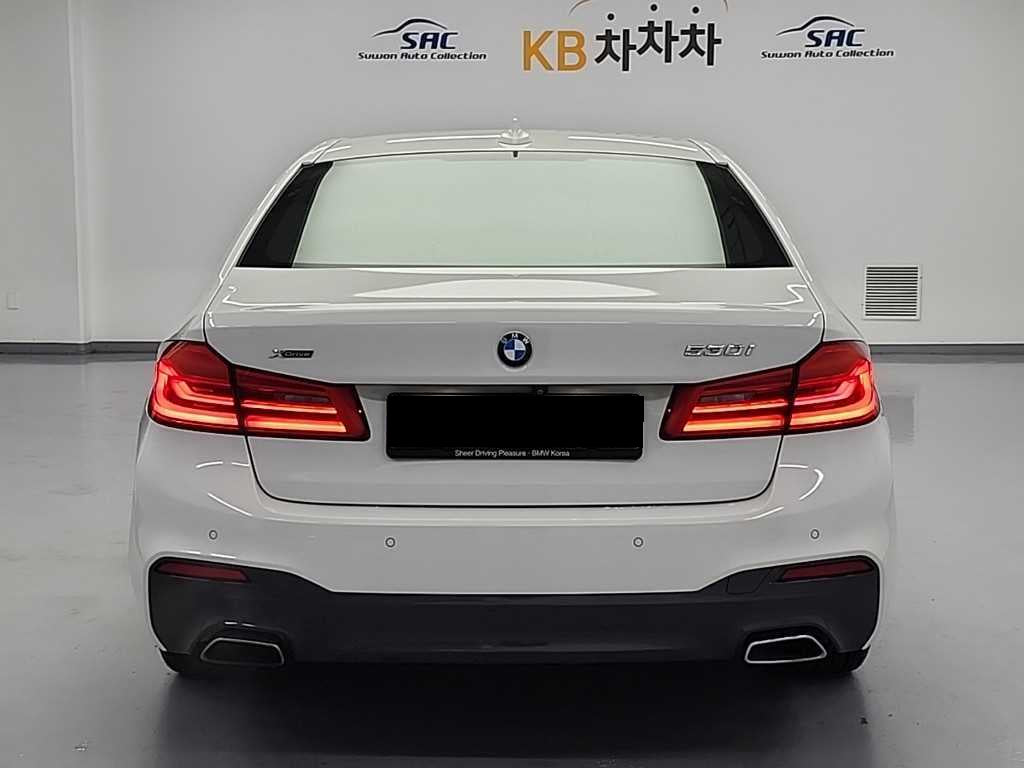 BMW 5-Series — photo 04