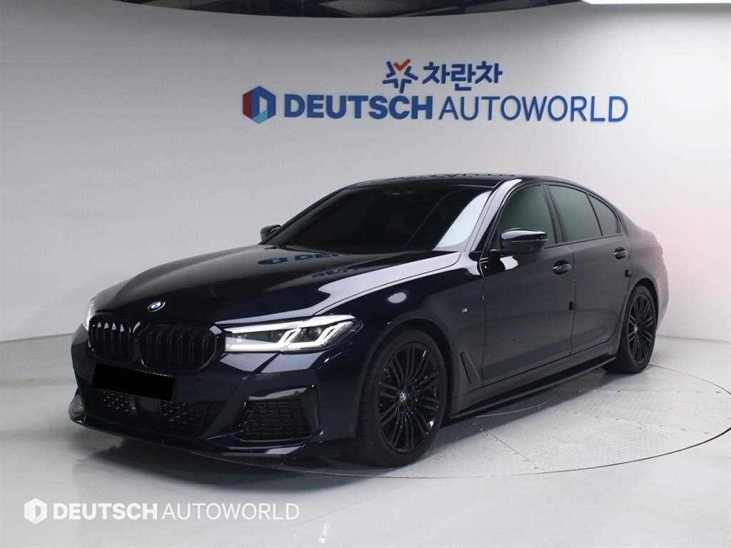 BMW 5-Series — photo 01