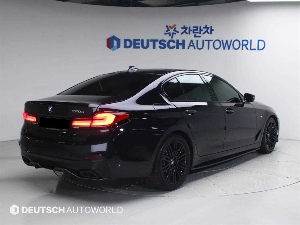BMW 5-Series — photo 02