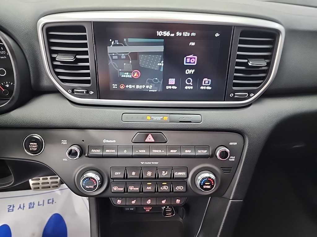 Kia Sportage — photo 10