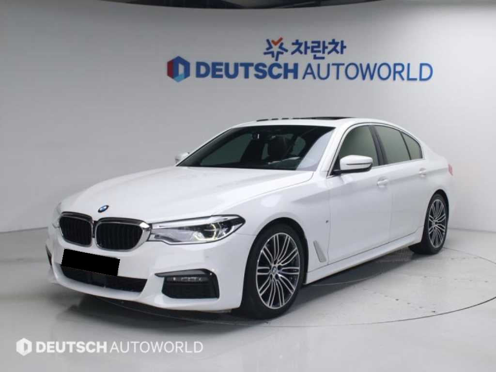 BMW 5-Series — photo 01