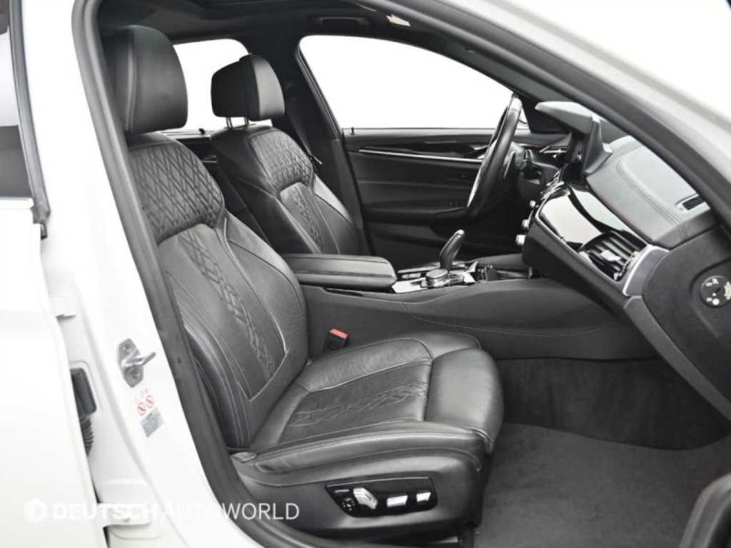 BMW 5-Series — photo 10