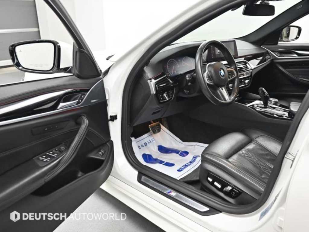 BMW 5-Series — photo 11