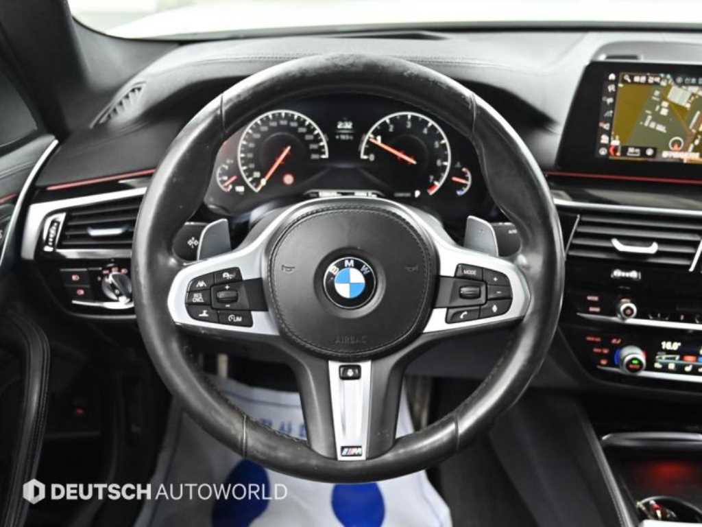 BMW 5-Series — photo 13