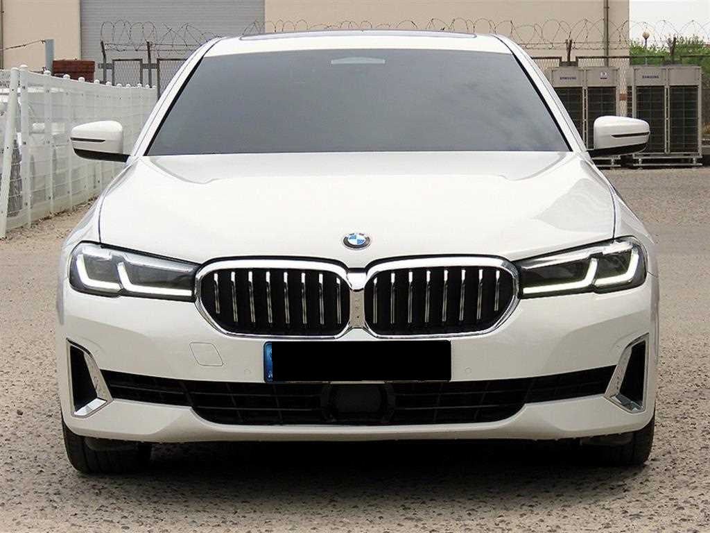 BMW 5-Series — photo 01