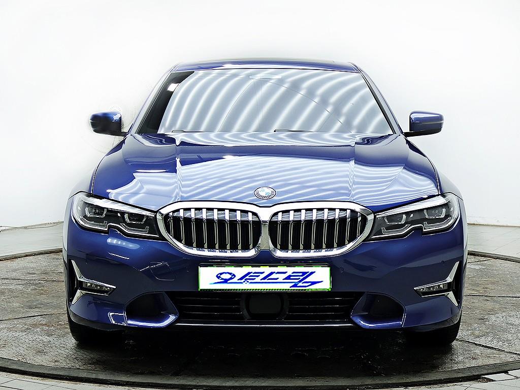 BMW 3-Series — photo 01